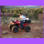 Riding 4 Wheeler.jpg
